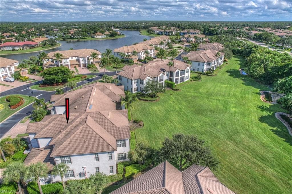 Aerial view of residential area with a large body of water
