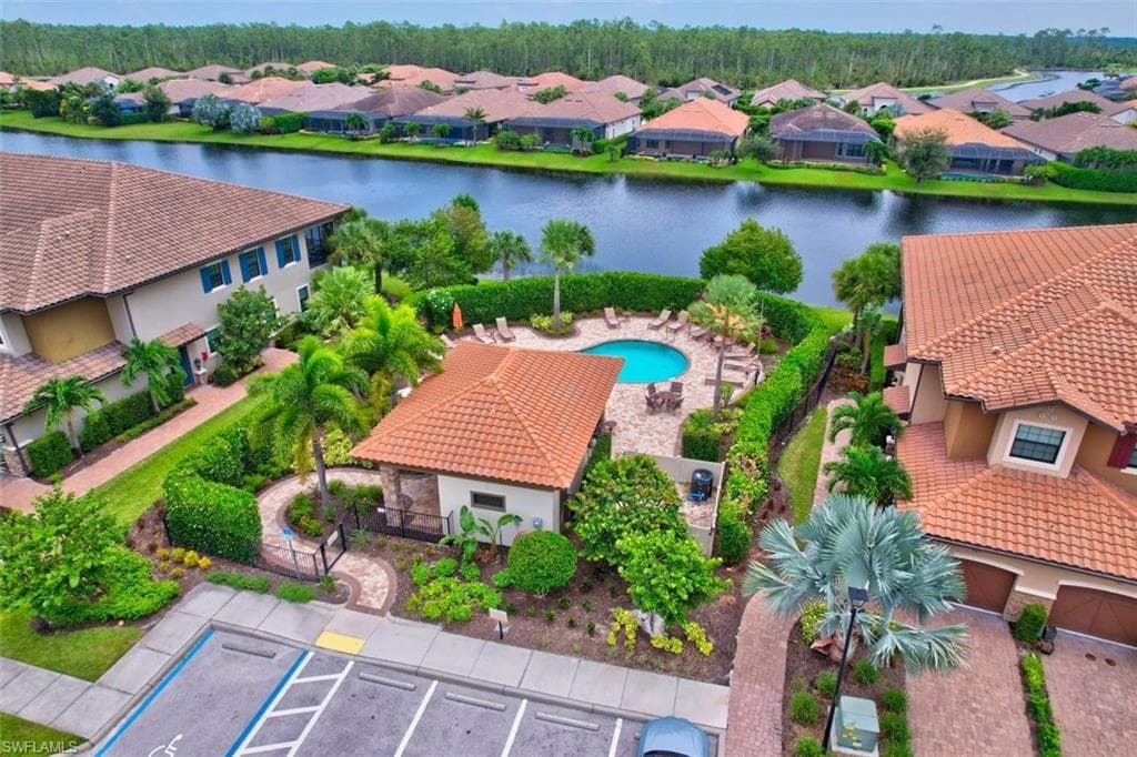 Community pool and grill steps away from subject property