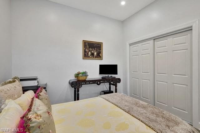 Third bedroom featuring a closet and recessed lighting