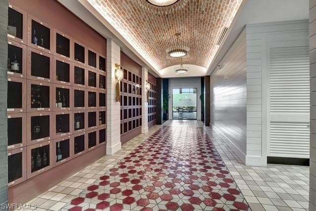 Hallway to the Barrel House Bar featuring private member wine lockers
