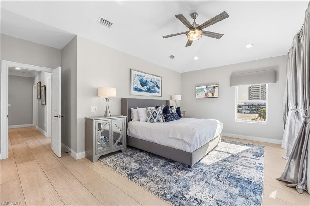 Bedroom featuring recessed lighting, a ceiling fan, and light wood-style flooring
