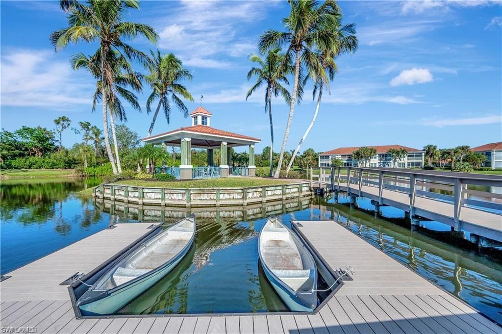 Dock area featuring a water view and a gazebo