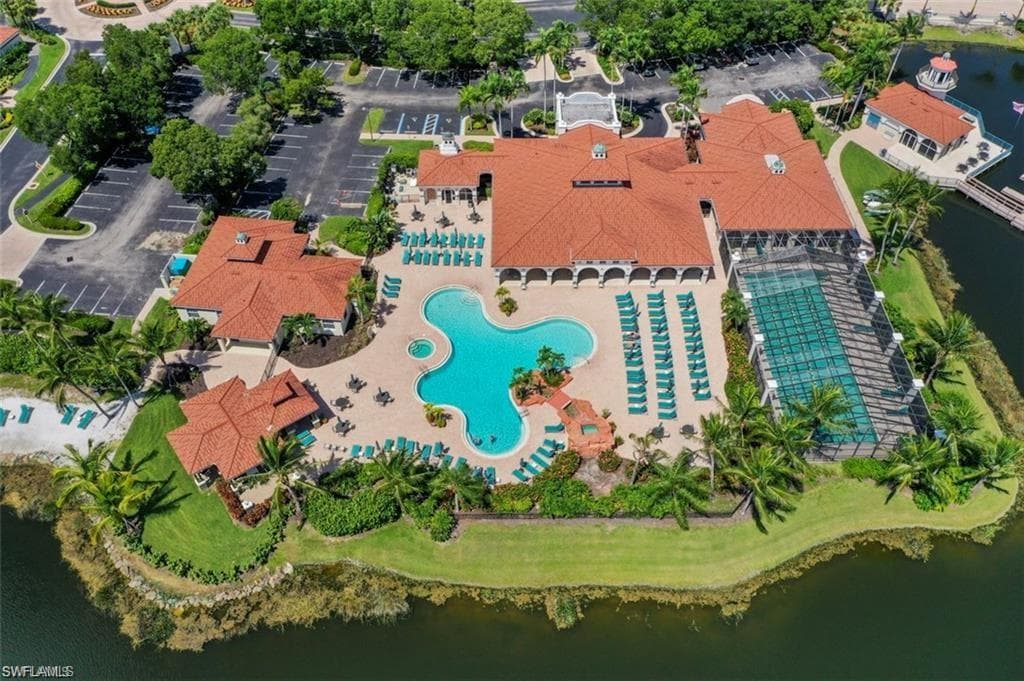 View of property location featuring a pool area and a large body of water