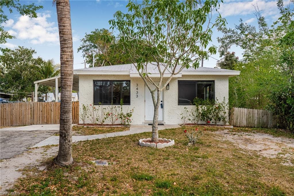 View of front of property with stucco siding
