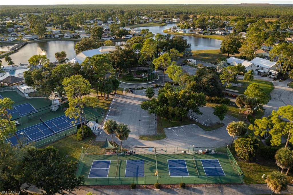 Aerial view of residential area with a nearby body of water