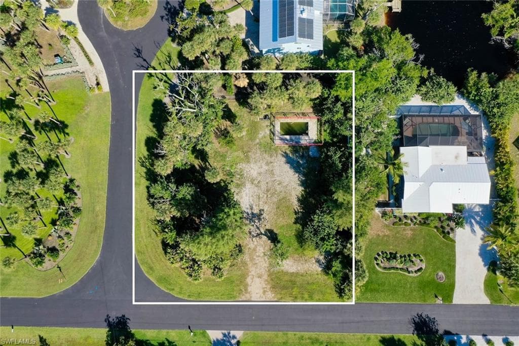 Aerial view of property's location featuring property parcel outlined