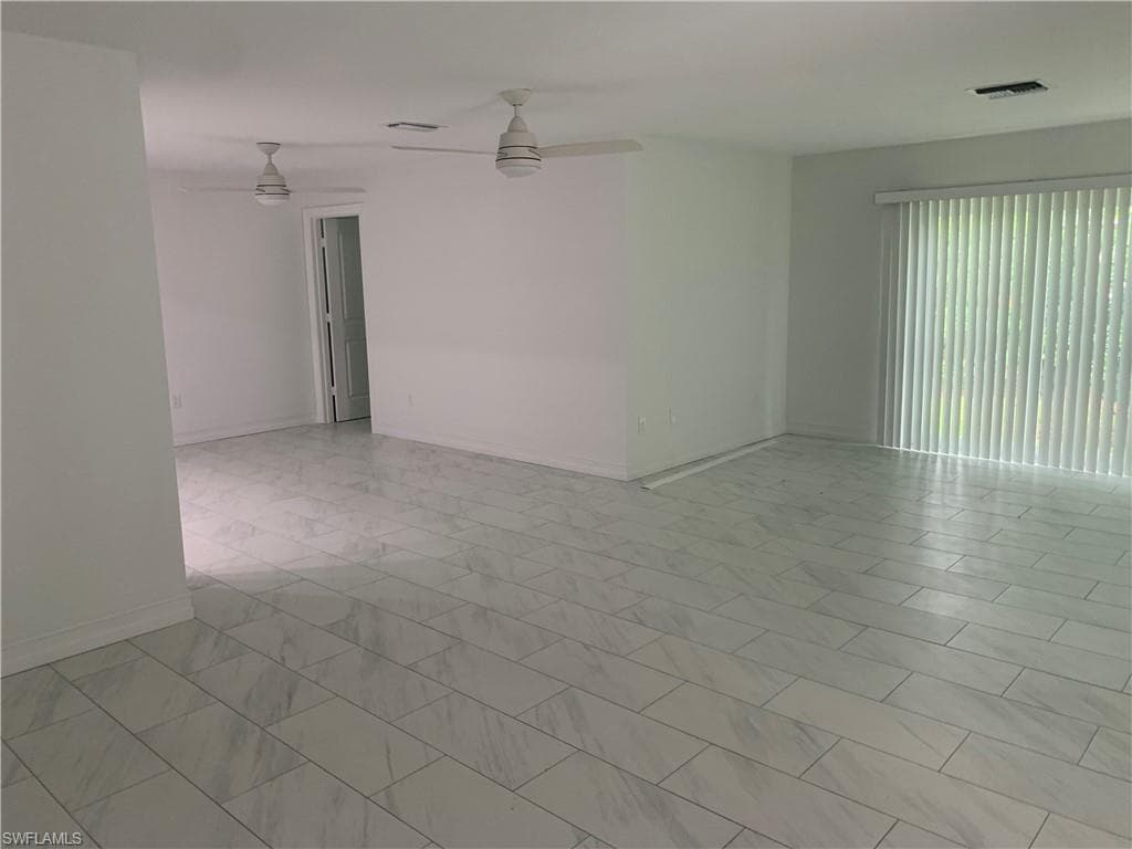 Generous Living room featuring a open Dining area off kitchen