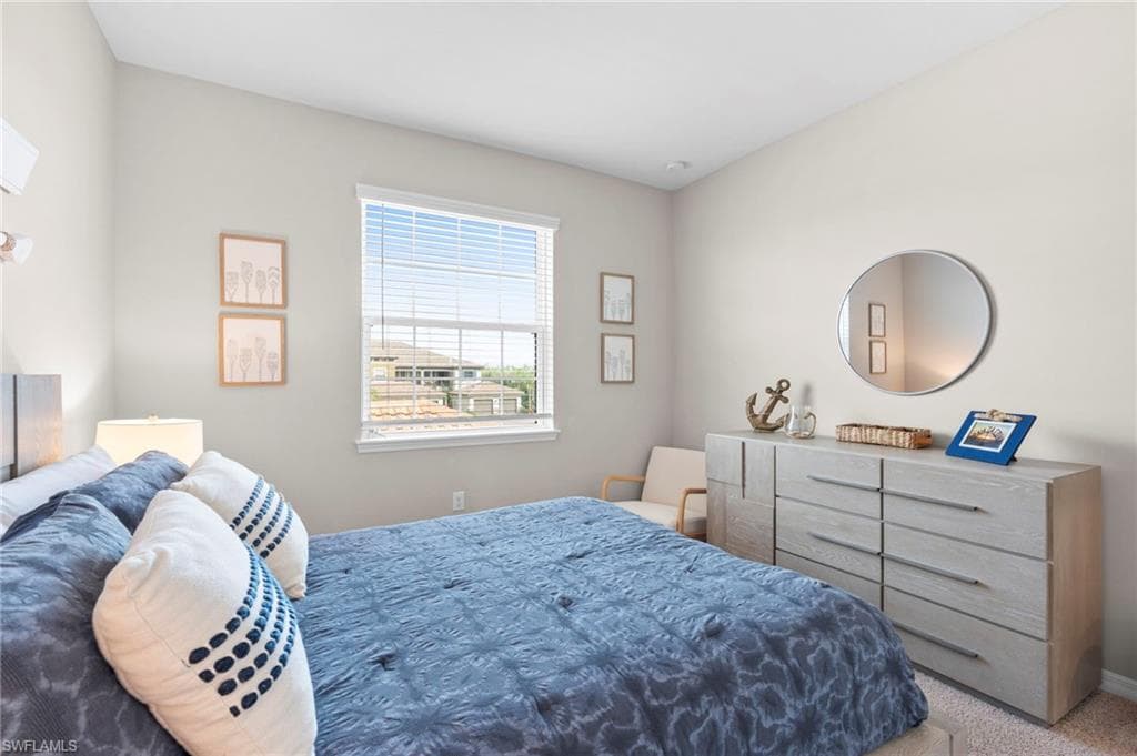 Bedroom featuring carpet flooring