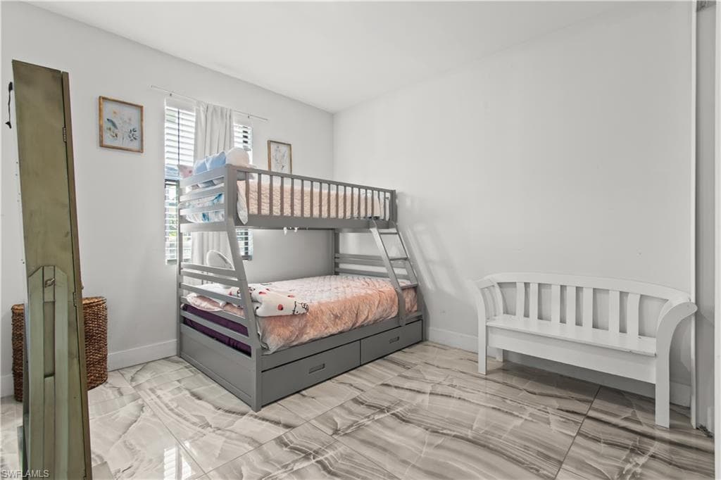Bedroom with baseboards