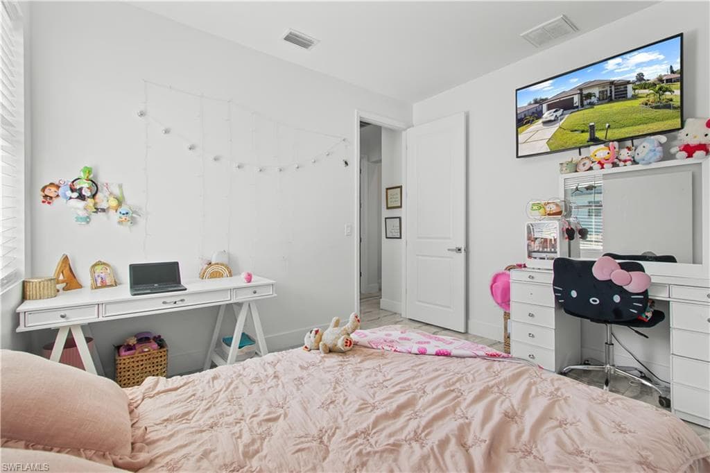 Bedroom with baseboards
