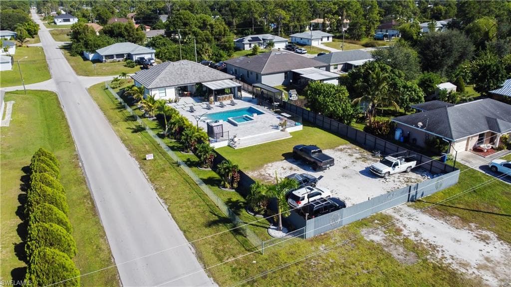 Aerial view of residential area with a pool