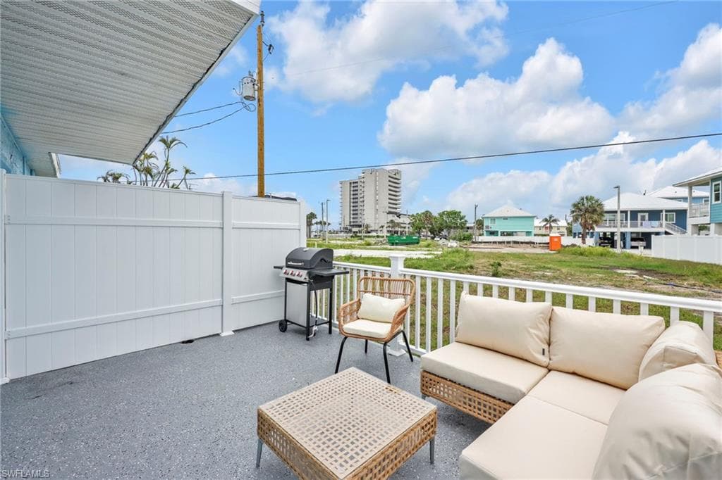 View of patio / terrace featuring a grill and an outdoor living space