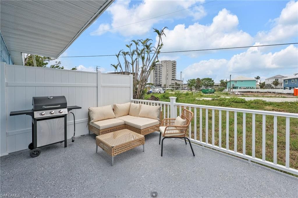 View of patio / terrace with area for grilling and an outdoor hangout area