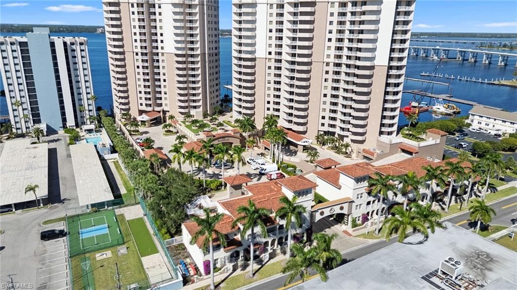 Bird's eye view of a large body of water and apartment complex