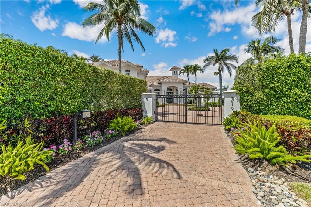 Gate with a fenced front yard