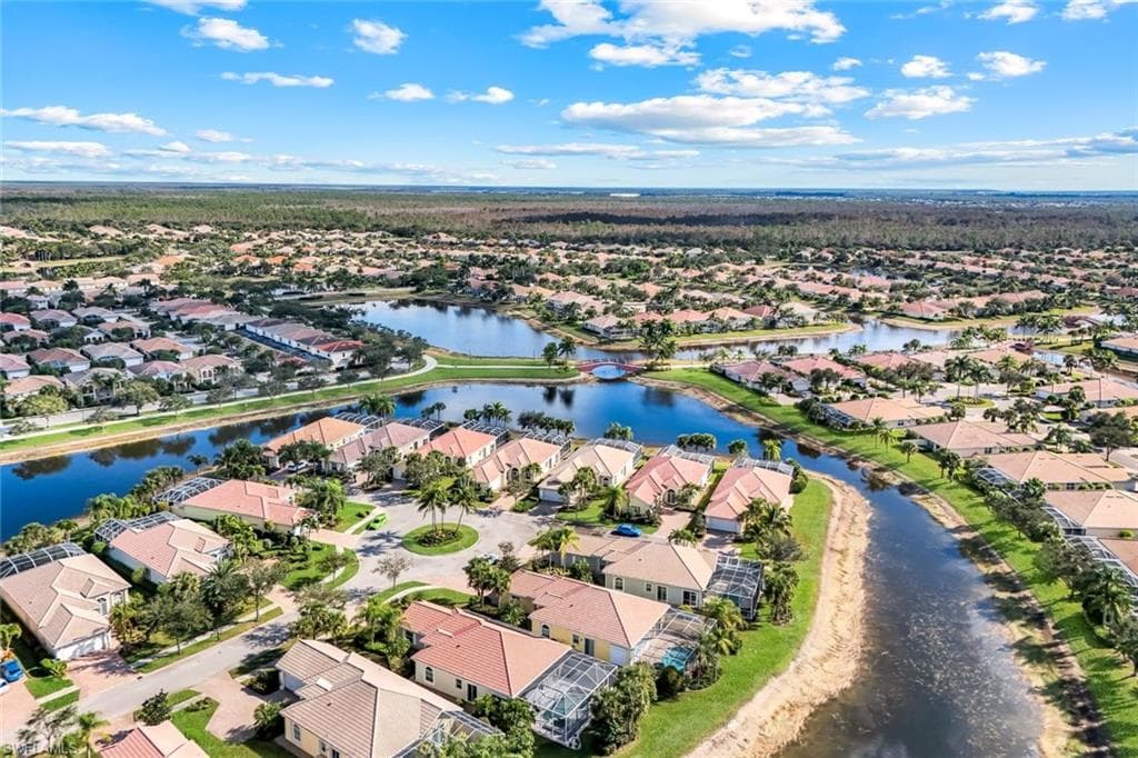 Aerial view of residential area with a nearby body of water
