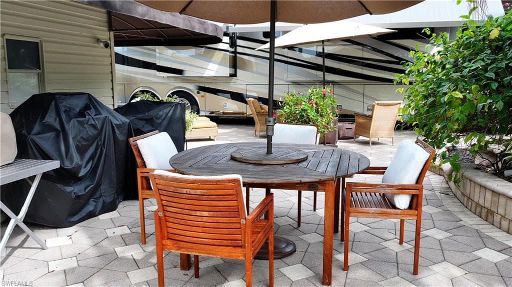 View of patio / terrace with outdoor dining space and area for grilling