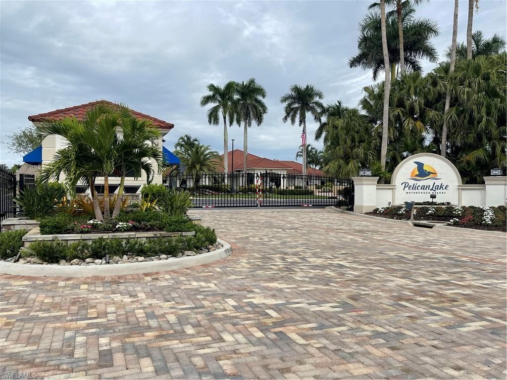 View of home's community featuring a gate