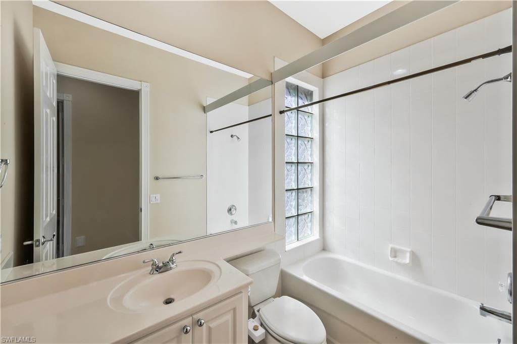 Full bath featuring bathing tub / shower combination and vanity