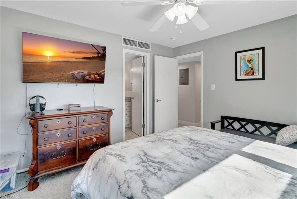 Master Bedroom featuring, ceiling fan, ensuite bathroom, and TV