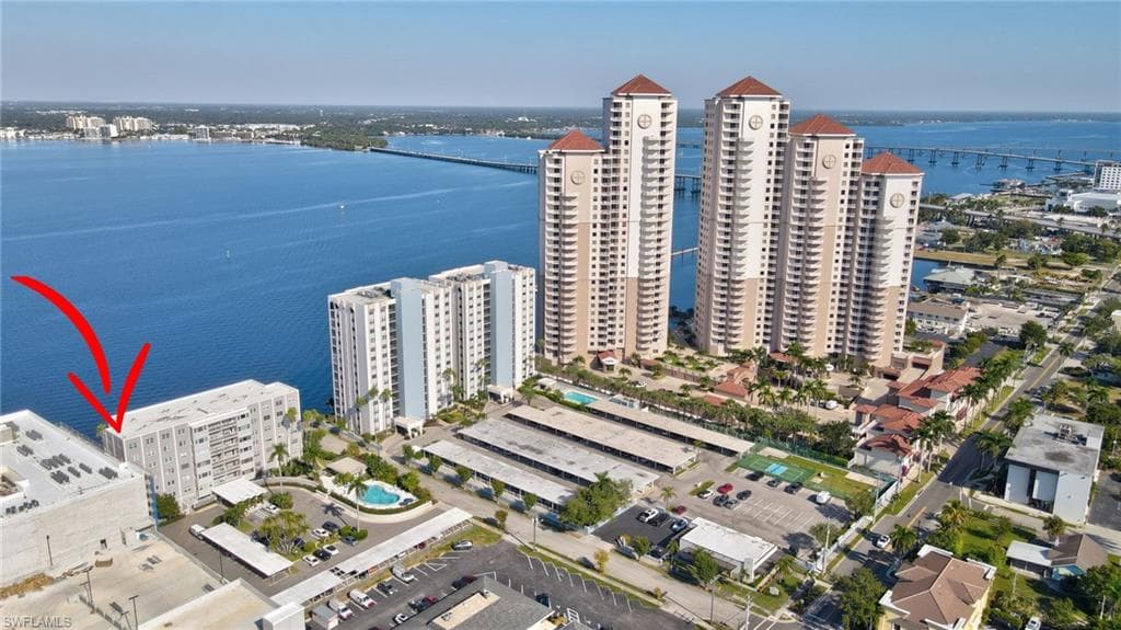 Condo view with pool and neighbors