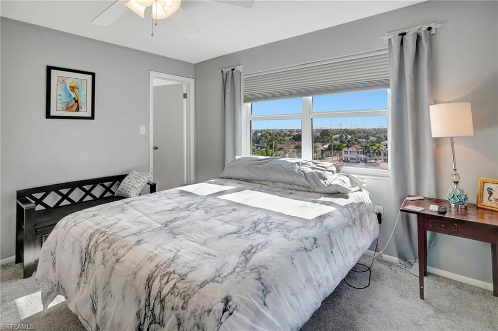 Master Bedroom has view of community.