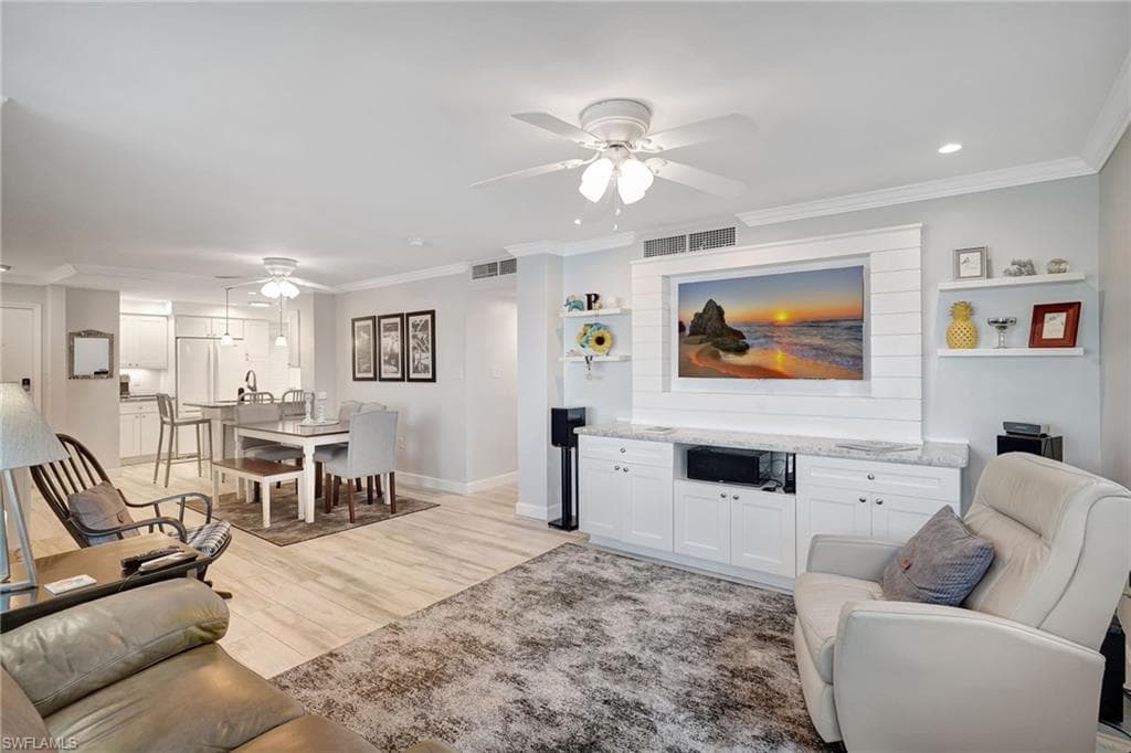 Living & dining area featuring open great room concept.