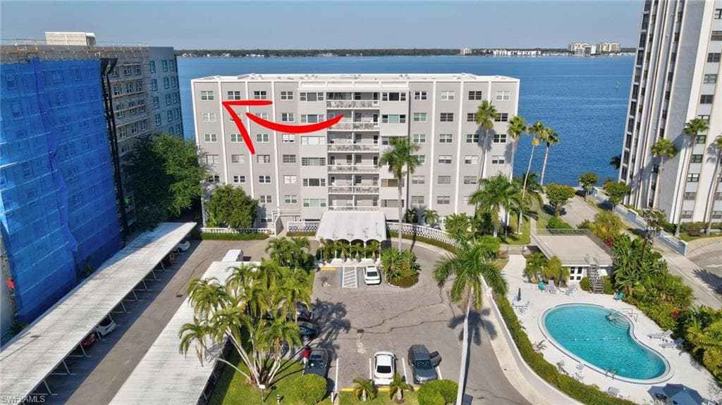 Bird's eye view of The Riverside Club condo, river, heated pool & parking