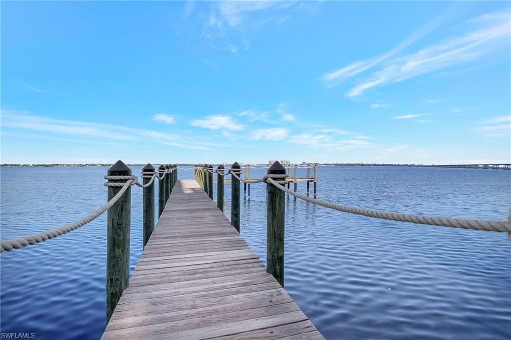 Dock with a water view of Caloosahatchee River
