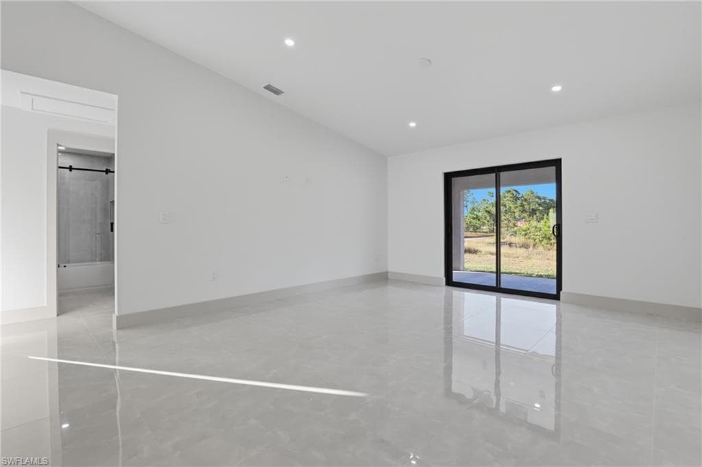 Spare room with recessed lighting