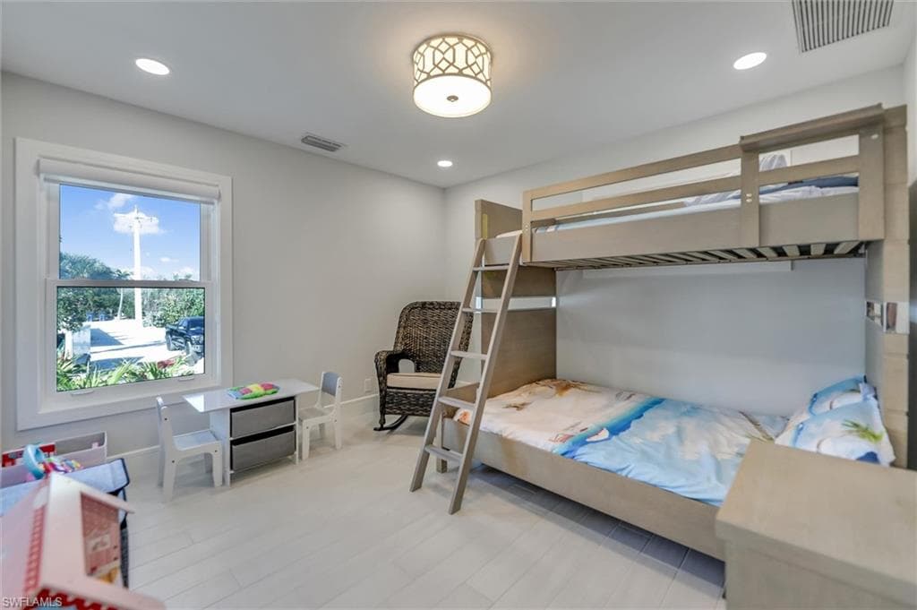 Bedroom with recessed lighting