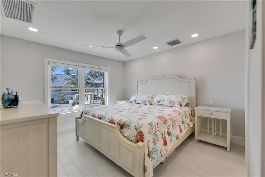 Bedroom featuring recessed lighting and a ceiling fan