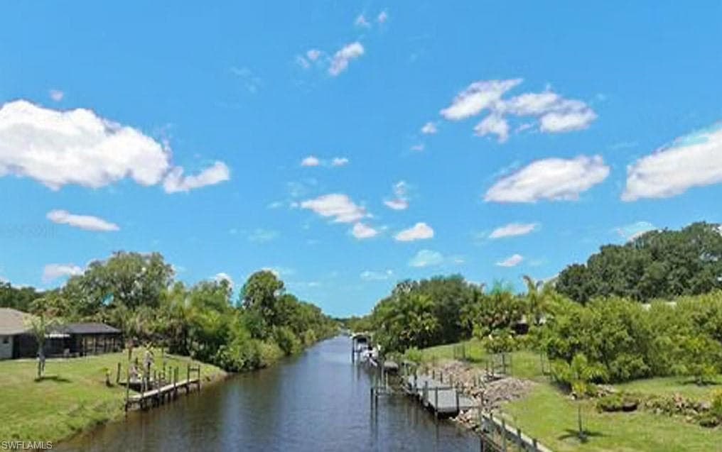 Water view with a boat dock