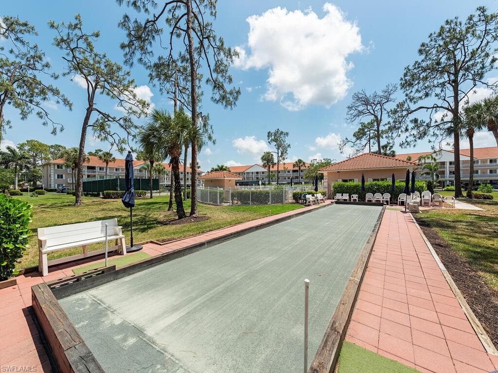 Surrounding community featuring a bocce ball area, a residential view, and a gazebo