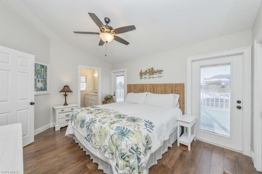 Primary bedroom with hurricane protected French doors to upper deck