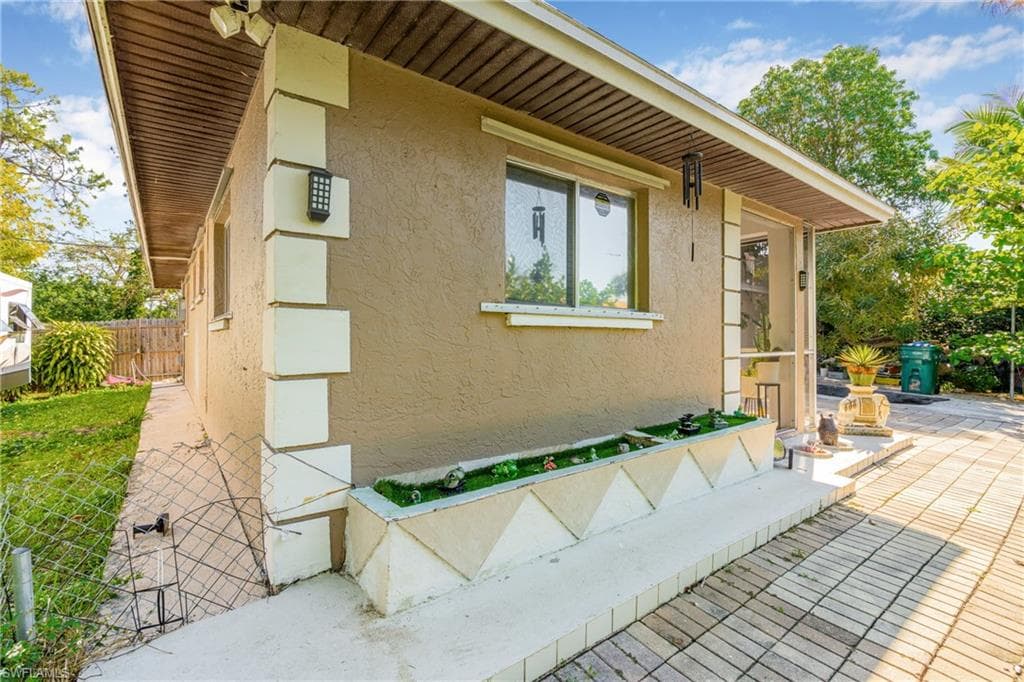 View of home's exterior with stucco siding