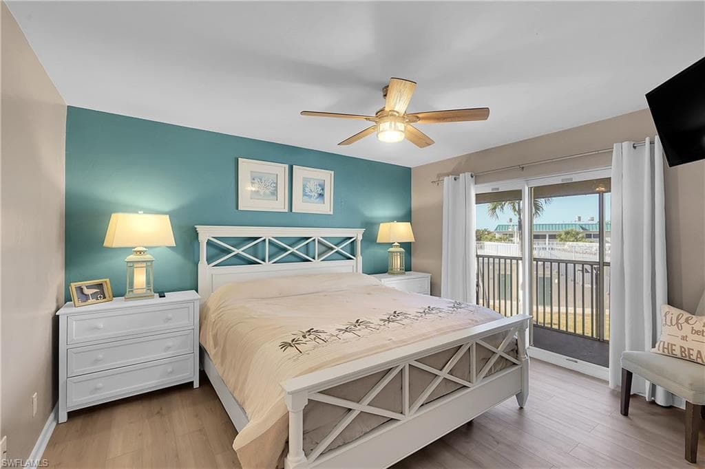 Primary Bedroom with access to private balcony.