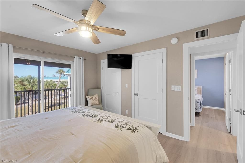 Primary Bedroom with lots of natural light and 2 closets.
