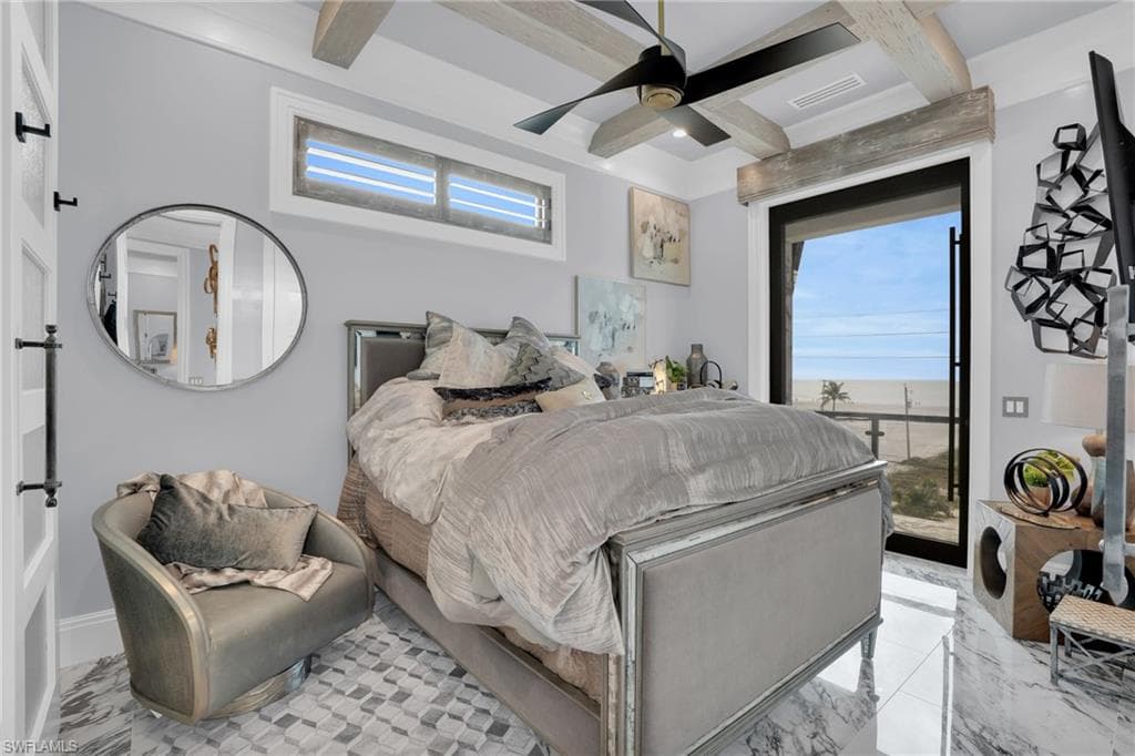 Bedroom featuring marble tiled floors, multiple windows, ceiling fan, beam ceiling, and coffered ceiling - Virtually Edited Image