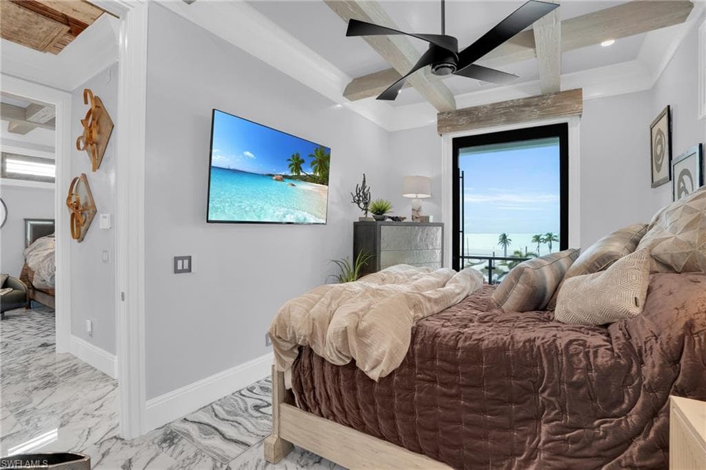 Bedroom with marble look tile flooring, ceiling fan, beam ceiling, coffered ceiling, and access to exterior - Virtually Edited Image