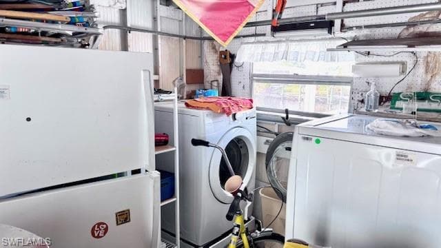 Laundry and additional refrigerator in Shed