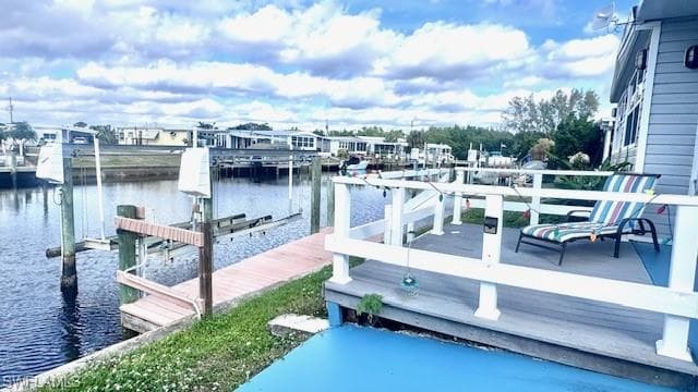 Trek decking at waterfront ; Dock area with boat lift, a water view