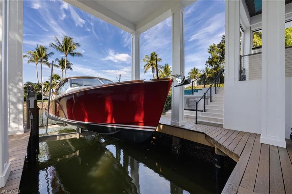 Dock featuring boat lift