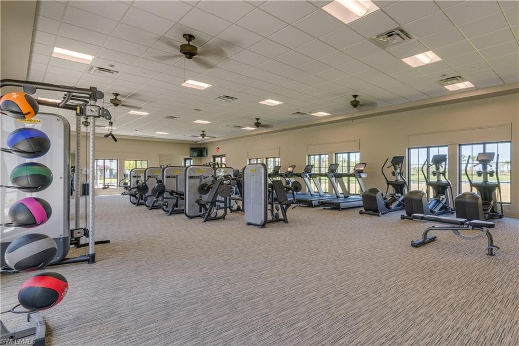 Exercise room featuring a drop ceiling