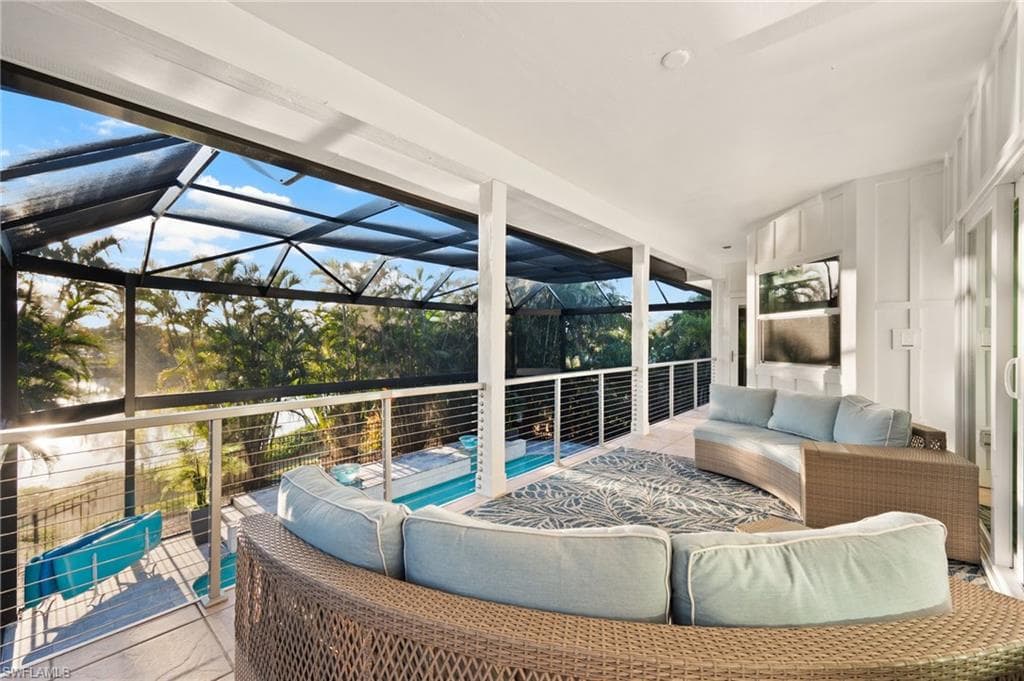 Large balcony overlooking the expansive pool area!!