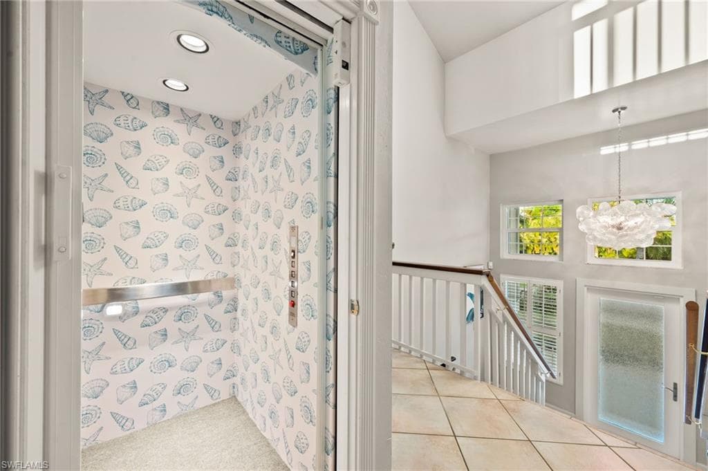 Either use the stair entry or just call the elevator to the garage level for easy access