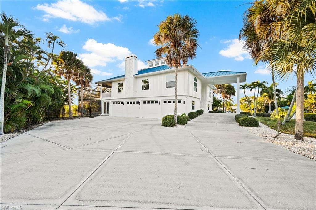 4 car garage and side pool entrance!!