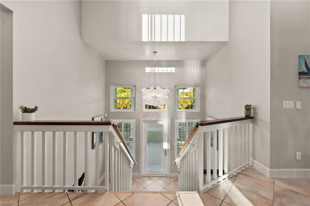 Beautiful Entry with stairs leading to main floor