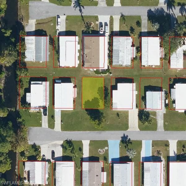 Aerial overview of property's location with property parcel outlined
