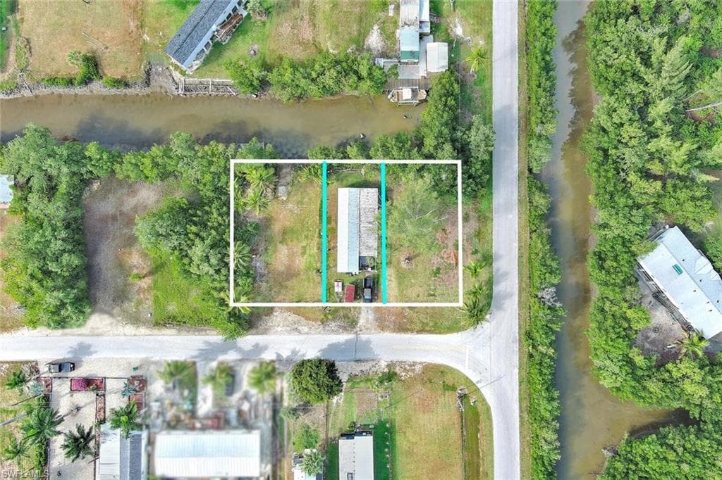 Aerial view of property's location with all 3 property parcels outlined